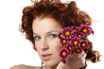 Fototapeta premium Portrait of a happy women with flowers