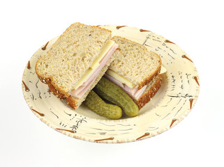 Turkey and cheese sandwich with pickles