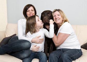Three Generations of a Family with their Dog