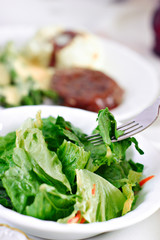 Very green salad with shallow depth of field.