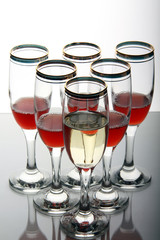 Wine goblets on mirror table