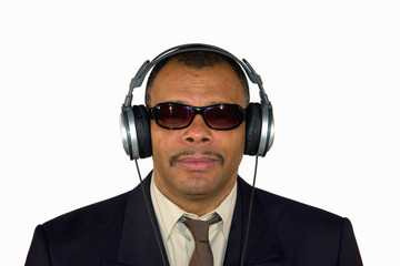 serious looking soulman with sunglasses and headphones