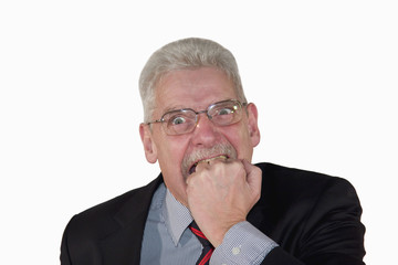 caucasian senior manager biting into his fist