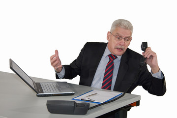 senior businessman getting kicked via phone