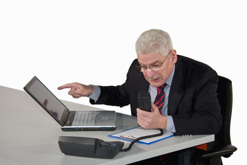 angry caucasian senior manager yelling into the phone