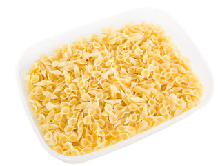 One side curled short-cut pasta in plastic container.