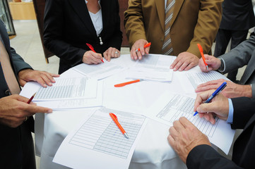 people working at a meeting