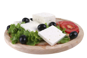 served goat cheese with vegetables