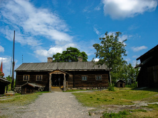 Fototapeta na wymiar Red cabin in Skansen park (Stockholm, Sweden)