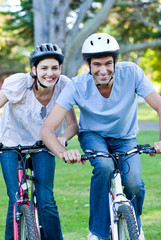 Obraz premium Animated couple riding a bike