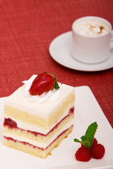 Strawberry cake with cappuccino