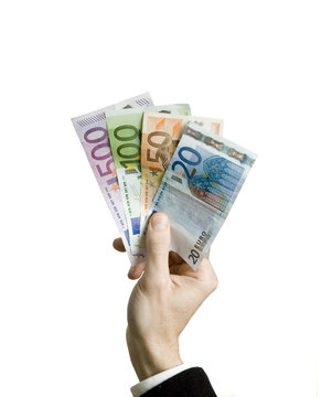 businessman hand holding euro bills isolated on white background