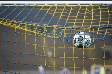 A soccer ball scores