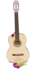 Obraz premium a yellow acoustic guitar isolated on white