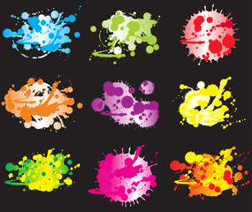 set of four rainbow-colored ink splats