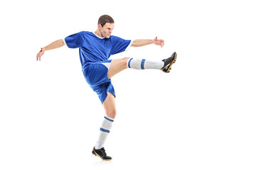 A soccer player shooting isolated on white background