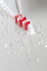 Toothbrush in a water splash