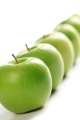 line of green apples