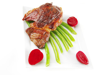 beef meat served on white