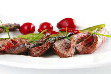 meat and vegetables on white plate