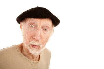Senior man in black beret