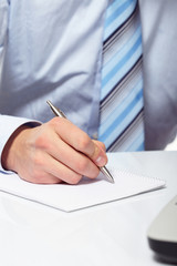 businessman's hand with pen