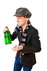 Young man with green bottle