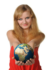 The young woman holds the globe in hands