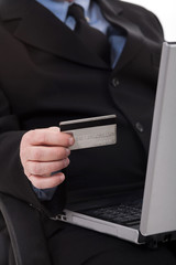 Business man with credit card focus on card