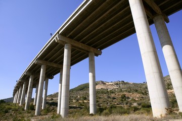 Fototapeta na wymiar Low angle perspective view of a motorway road bridge