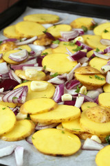 Raw potatoes, onion, garlic and parsley