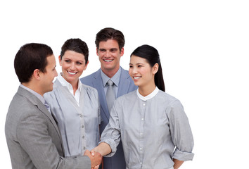Multi-ethnic business partners shaking hands