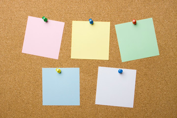 Corkboard with five blank notes