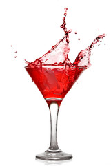 Red cocktail with splash isolated on white