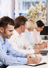 Fototapeta premium Businessman taking notes