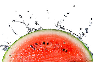 watermelon and water splash isolated on white © artjazz