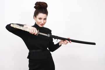 Beautiful woman wielding a samurai sword.