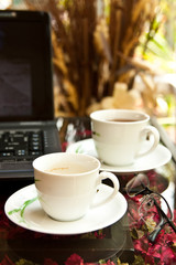 Coffee cup and notebook