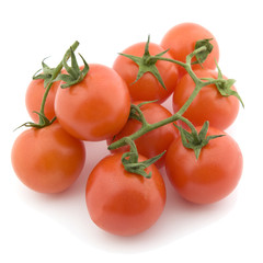 Cherry tomato with a grean twig on a white background