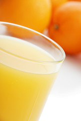 Orange juice and oranges
