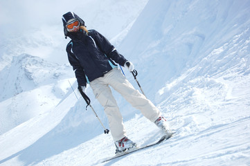 Fototapeta na wymiar Girl Skiing