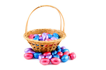 Fototapeta na wymiar Woven basket with easter eggs
