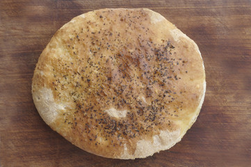 Homemade bread on wooden board.