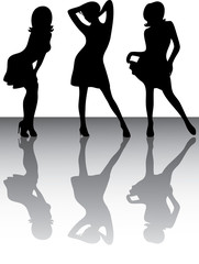 Silhouettes of three dancing girls.