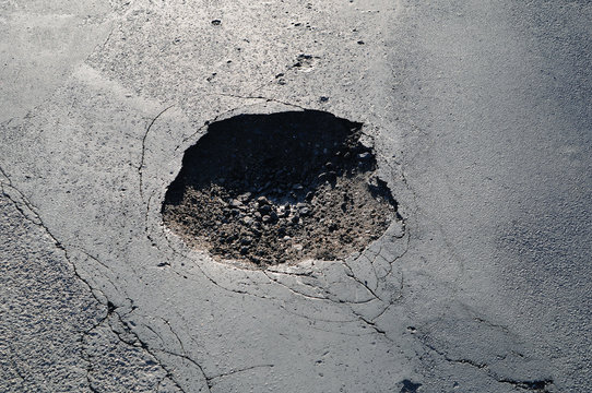 pothole in a road