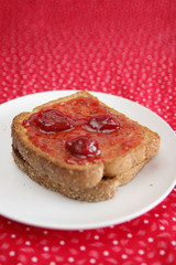 slice with strawberry jam