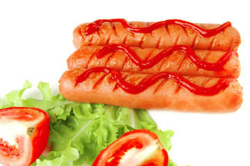 sausages with salad and tomato