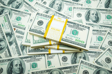 Stack of dollars on money background