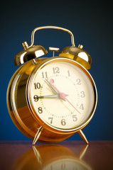 Alarm clock against colourful background