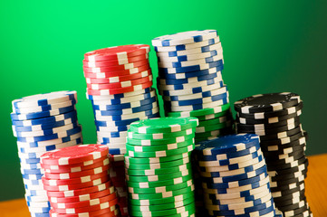 Stack of casino chips against gradient background